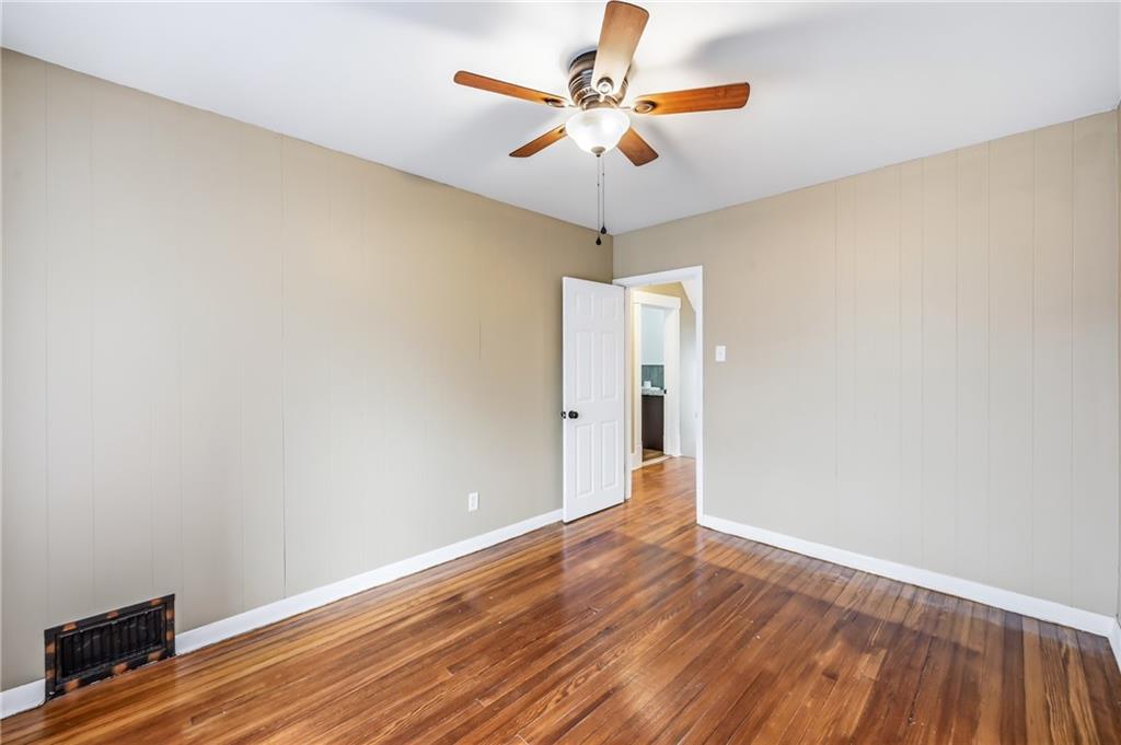 124 Wengler Avenue Sharon, PA 16146 - Photo 17 of 25 wooden floor in an empty room with a window