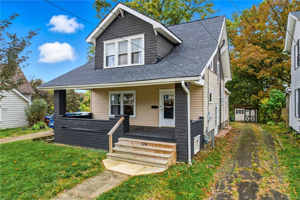 124 Wengler Avenue Sharon, PA 16146 - Photo 2 of 25 a front view of a house with a yard