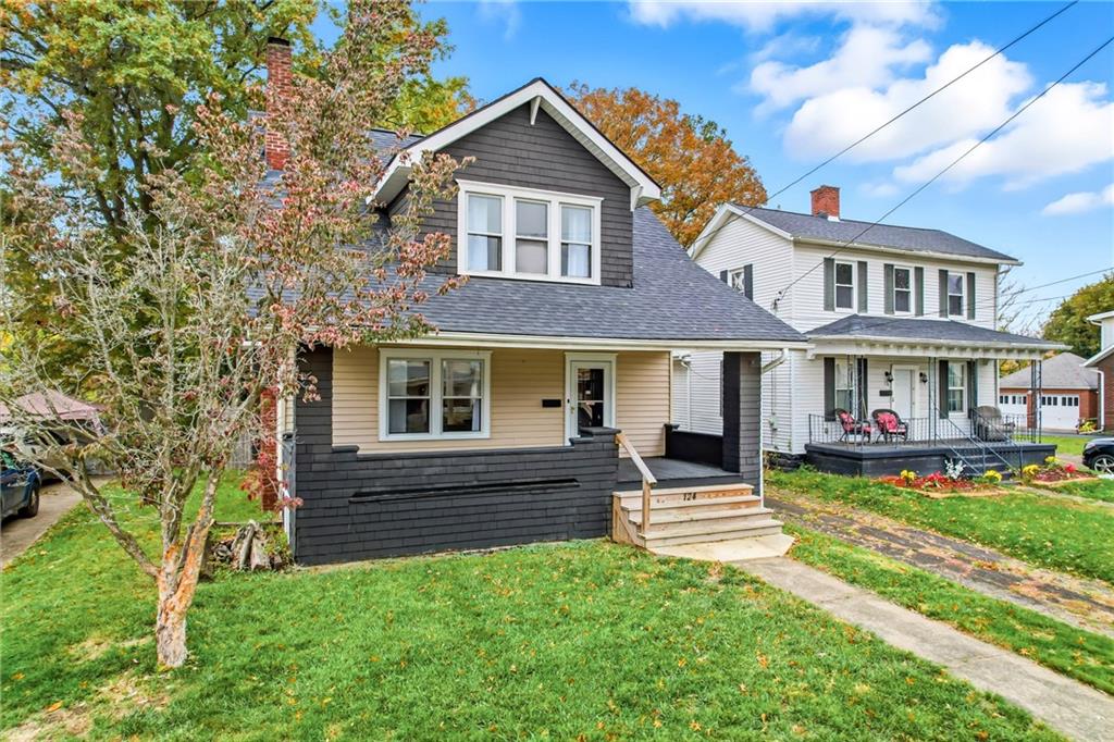 124 Wengler Avenue Sharon, PA 16146 - Photo 3 of 25 a front view of a house with a yard