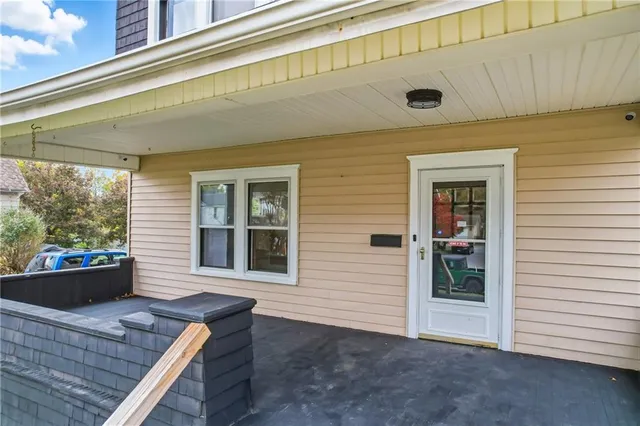 a view of house with backyard