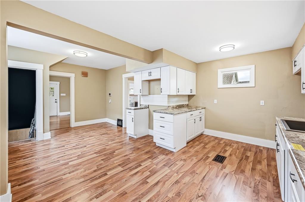 124 Wengler Avenue Sharon, PA 16146 - Photo 9 of 25 a view of a kitchen with wooden floor
