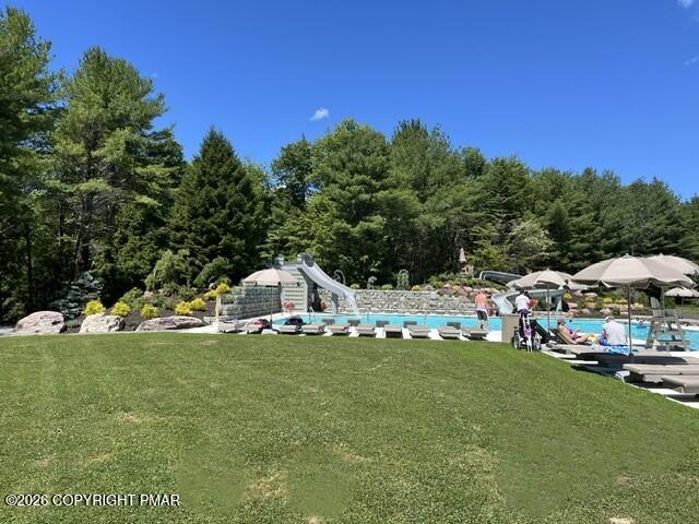 355 Windy Bush Road Long Pond, PA 18334 - Photo 46 of 49 a view of a white house with a big yard and large trees