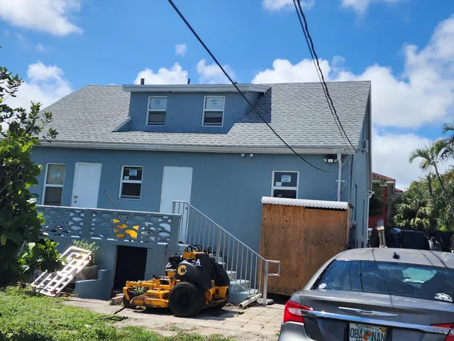 a front view of a house with yard