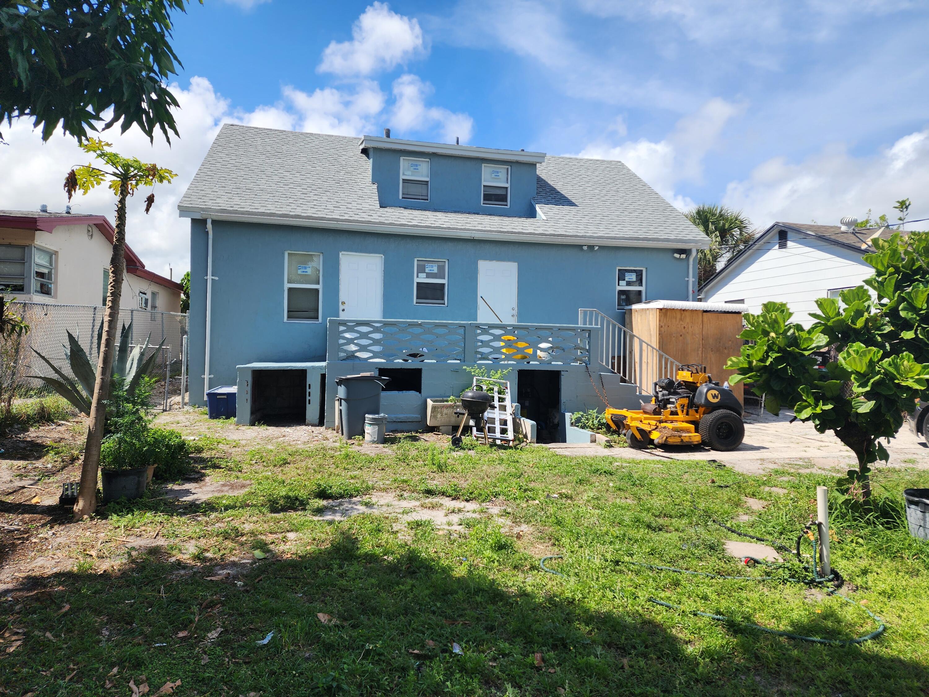 622 South C Street, Unit 1 Lake Worth Beach, FL 33460 - Photo 8 of 9 a view of a house with patio
