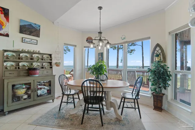 a kitchen with stainless steel appliances granite countertop a refrigerator and stove top oven