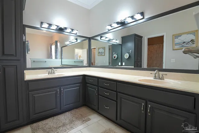a view of a patio with wooden floor table and chairs