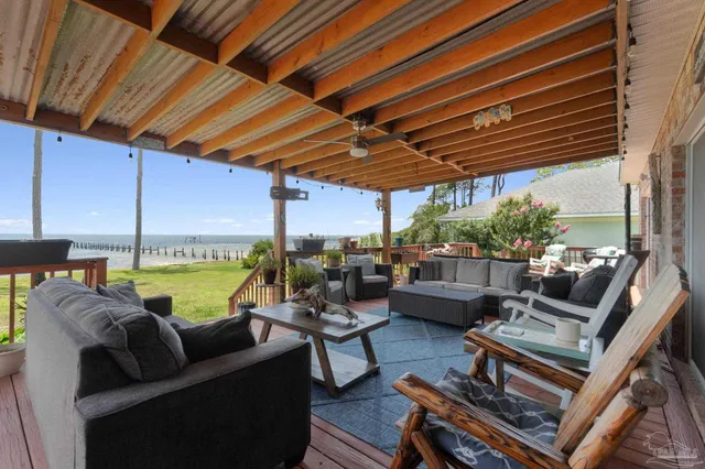 an aerial view of residential houses with outdoor space and street view