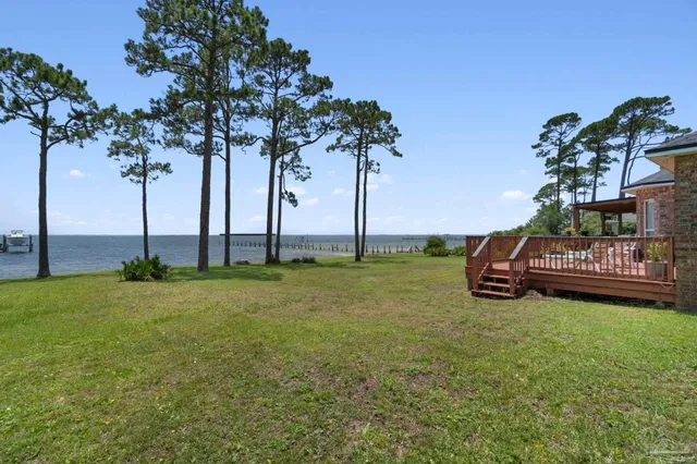 a view of a street with a sign board