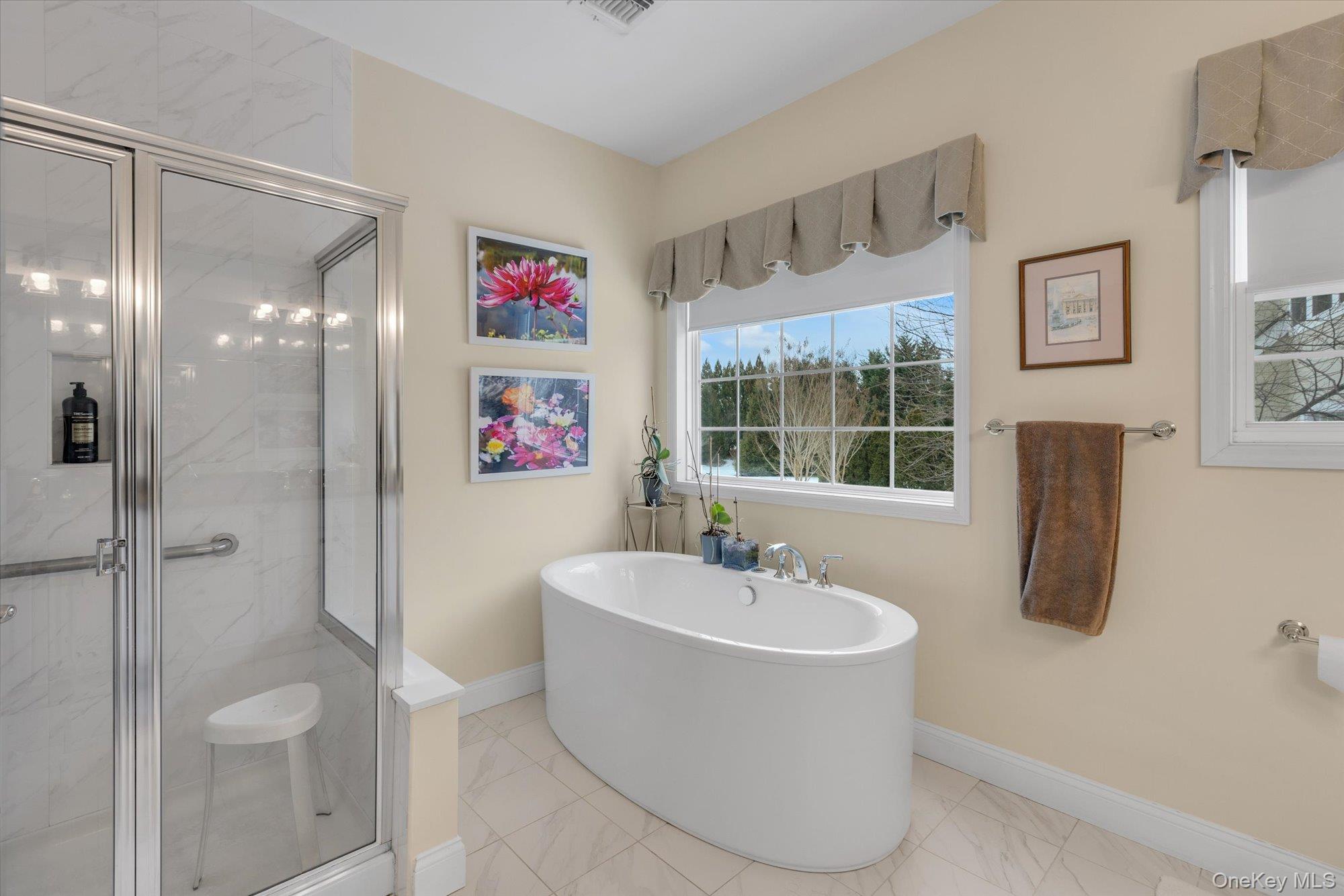 390 Stonecrop Road Riverhead, NY 11901 - Photo 15 of 24 a bathroom with a sink a toilet and shower
