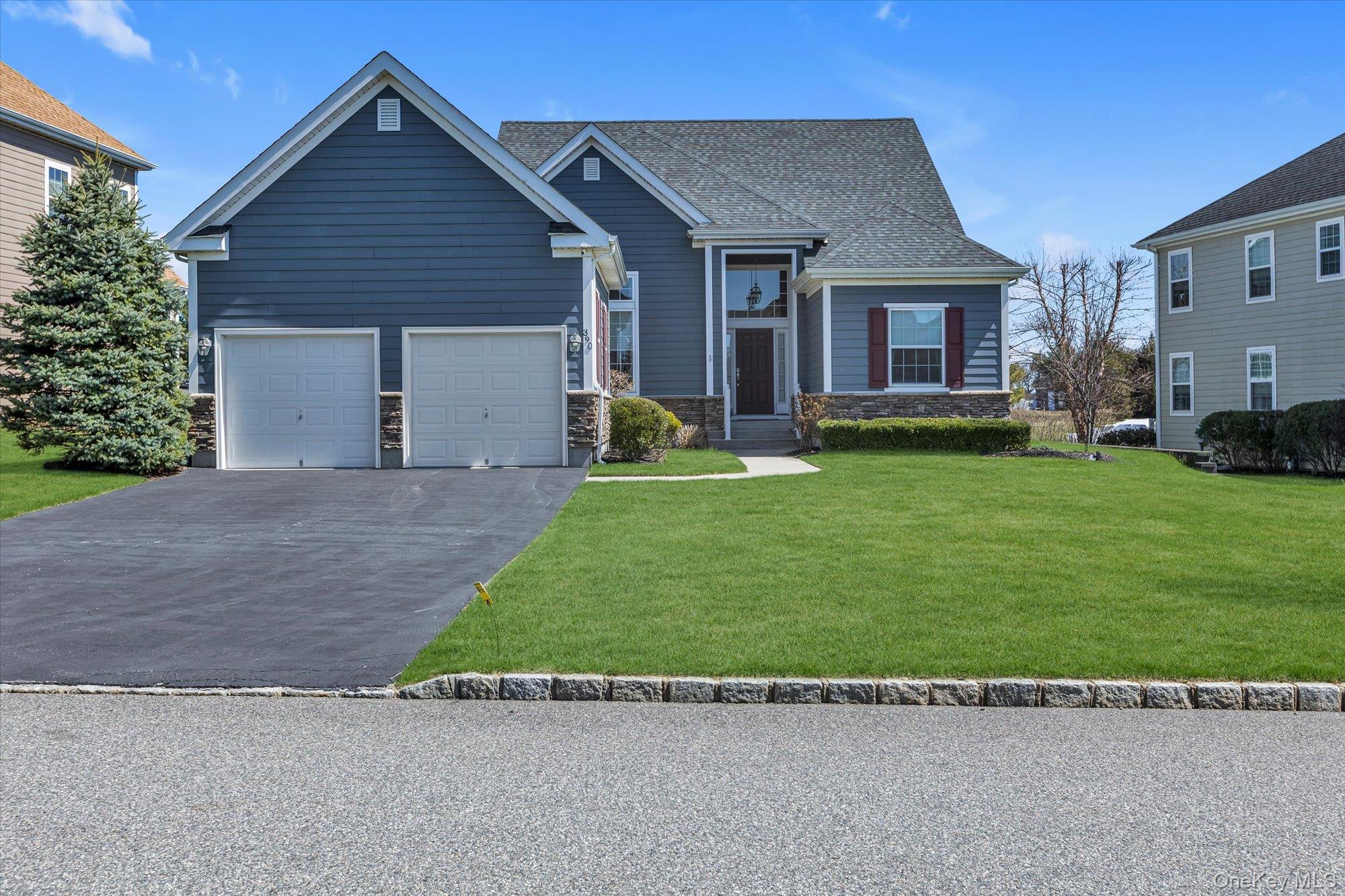 390 Stonecrop Road Riverhead, NY 11901 - Photo 23 of 24 a view of a house with a yard