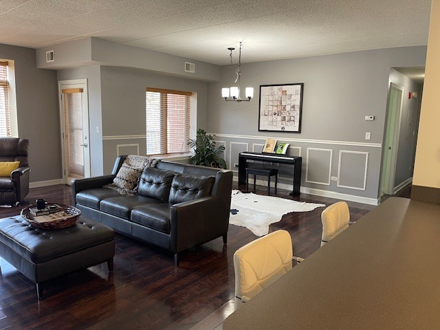 875 East 22nd Street, Unit 204 Lombard, IL 60148 - Photo 11 of 47 a living room with furniture and wooden floor