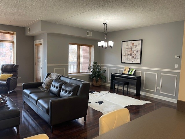 875 East 22nd Street, Unit 204 Lombard, IL 60148 - Photo 14 of 47 a living room with furniture and a fireplace