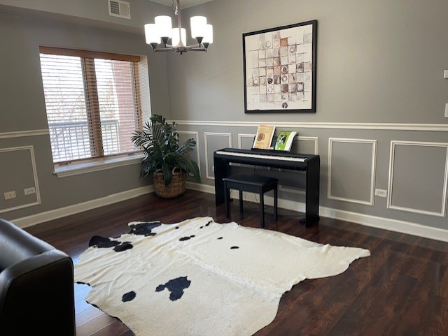875 East 22nd Street, Unit 204 Lombard, IL 60148 - Photo 15 of 47 a view of a dining room with furniture and chandelier