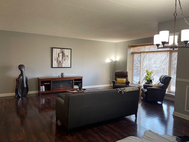 875 East 22nd Street, Unit 204 Lombard, IL 60148 - Photo 17 of 47 a living room with furniture a window and a table