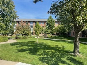 875 East 22nd Street, Unit 204 Lombard, IL 60148 - Photo 2 of 47 a backyard of a house with lots of green space