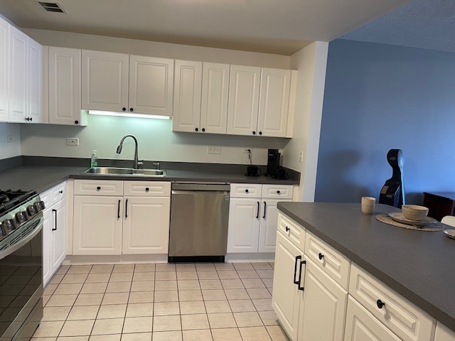875 East 22nd Street, Unit 204 Lombard, IL 60148 - Photo 25 of 47 a kitchen with a sink stove and cabinets