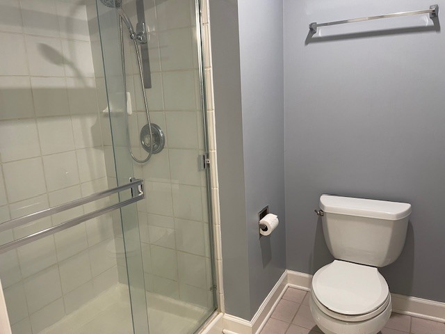 875 East 22nd Street, Unit 204 Lombard, IL 60148 - Photo 34 of 47 a white toilet sitting next to a bathroom sink