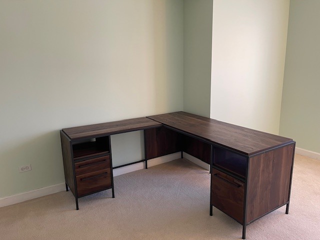 875 East 22nd Street, Unit 204 Lombard, IL 60148 - Photo 36 of 47 a room with a table and bed