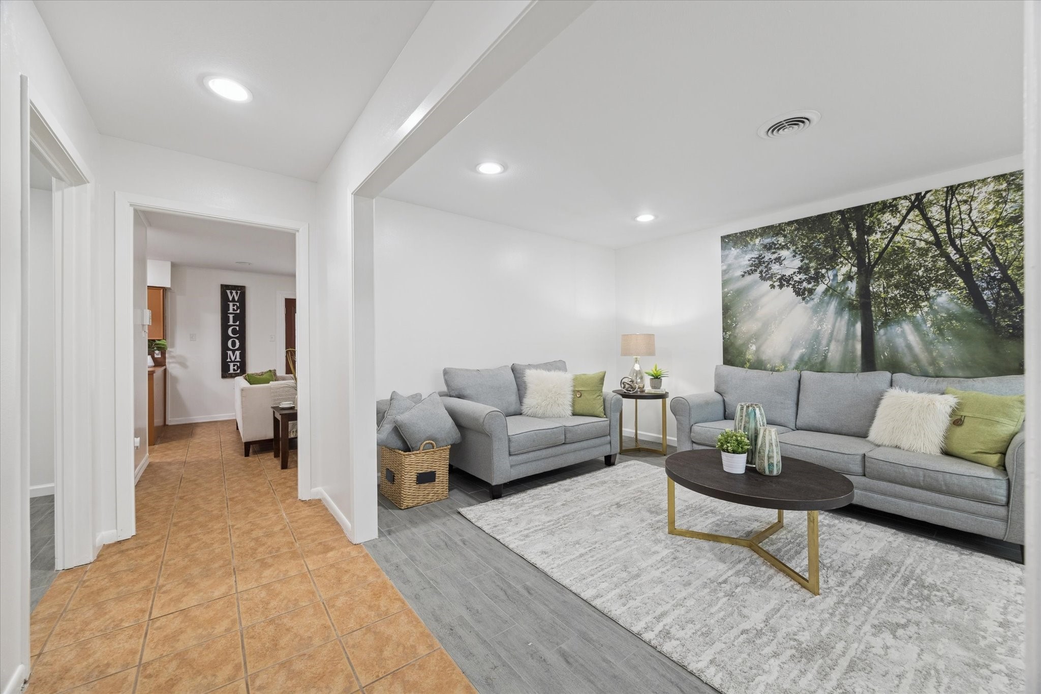 7539 Jason Street Houston, TX 77074 - Photo 3 of 16 a living room with furniture and a large window