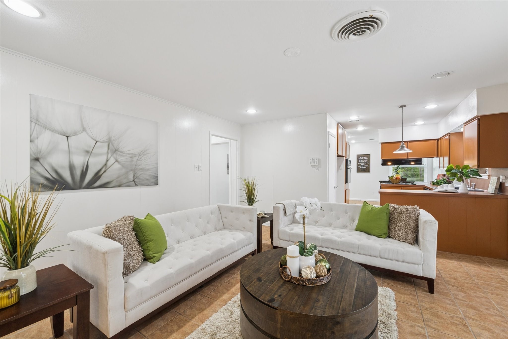 7539 Jason Street Houston, TX 77074 - Photo 5 of 16 a living room with furniture and a view of kitchen