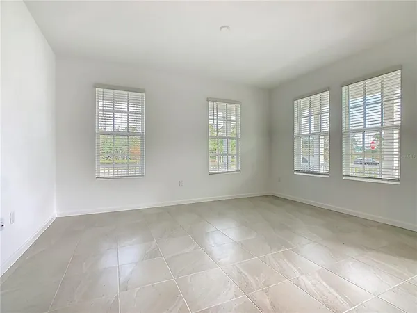 an empty room with windows