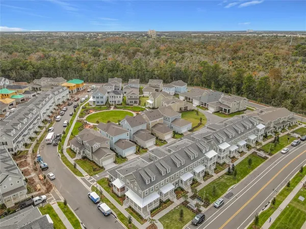 an aerial view of a house with a swimming pool