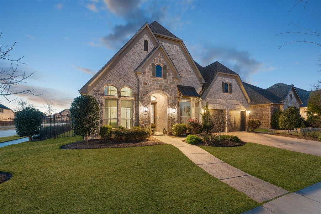 16509 Prairie Oak Road Frisco, TX 75033 - Photo 39 of 39 a front view of a house with a yard