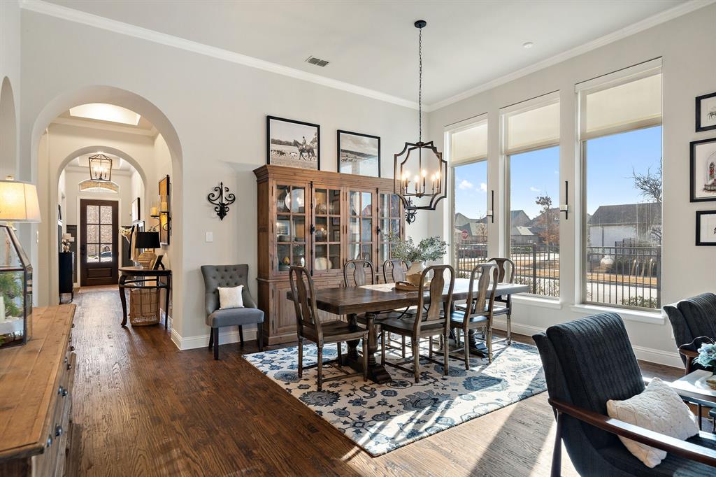 16509 Prairie Oak Road Frisco, TX 75033 - Photo 4 of 39 a view of a livingroom with furniture window and wooden floor