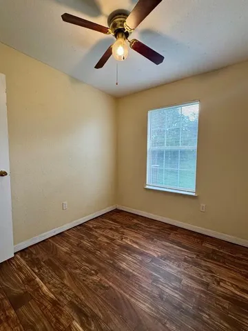 a bathroom with a sink a toilet and bathtub