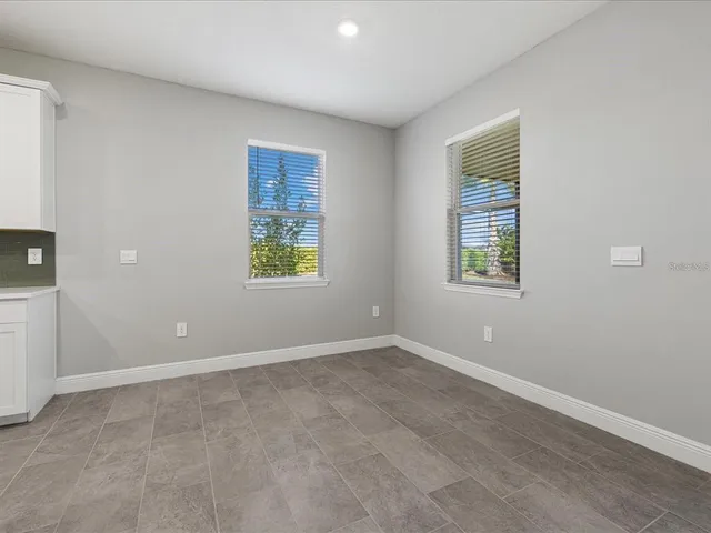 an empty room with windows