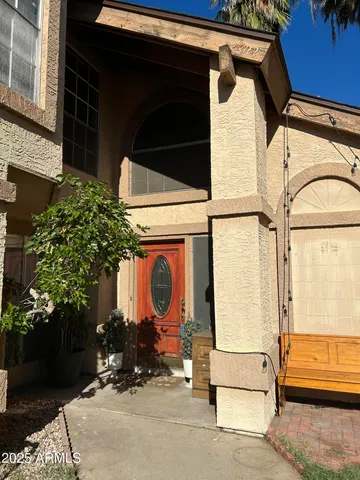 a view of entrance gate of a house