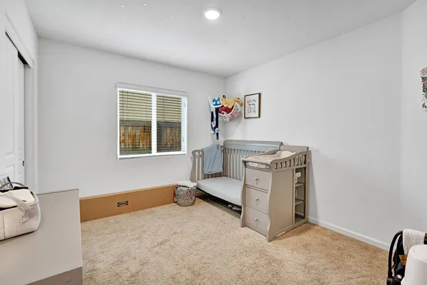 a view of livingroom with furniture and window