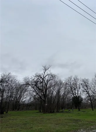 a view of a grassy field