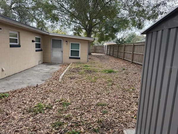 a house with trees in front of it