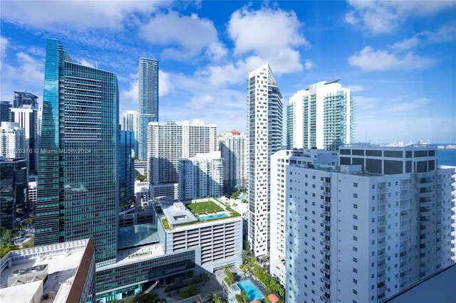 a view of roof deck with city view