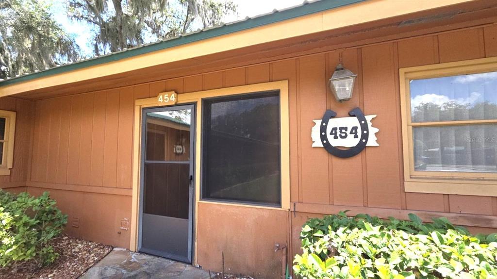 454 Cottage Circle, Unit 454 River Ranch, FL 33867 - Photo 3 of 27 a front view of a house