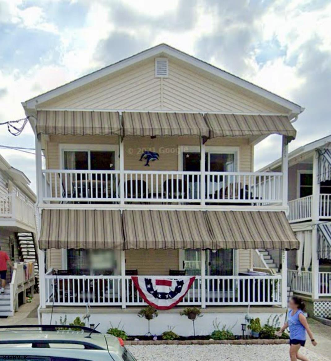 a view of a house with a roof deck