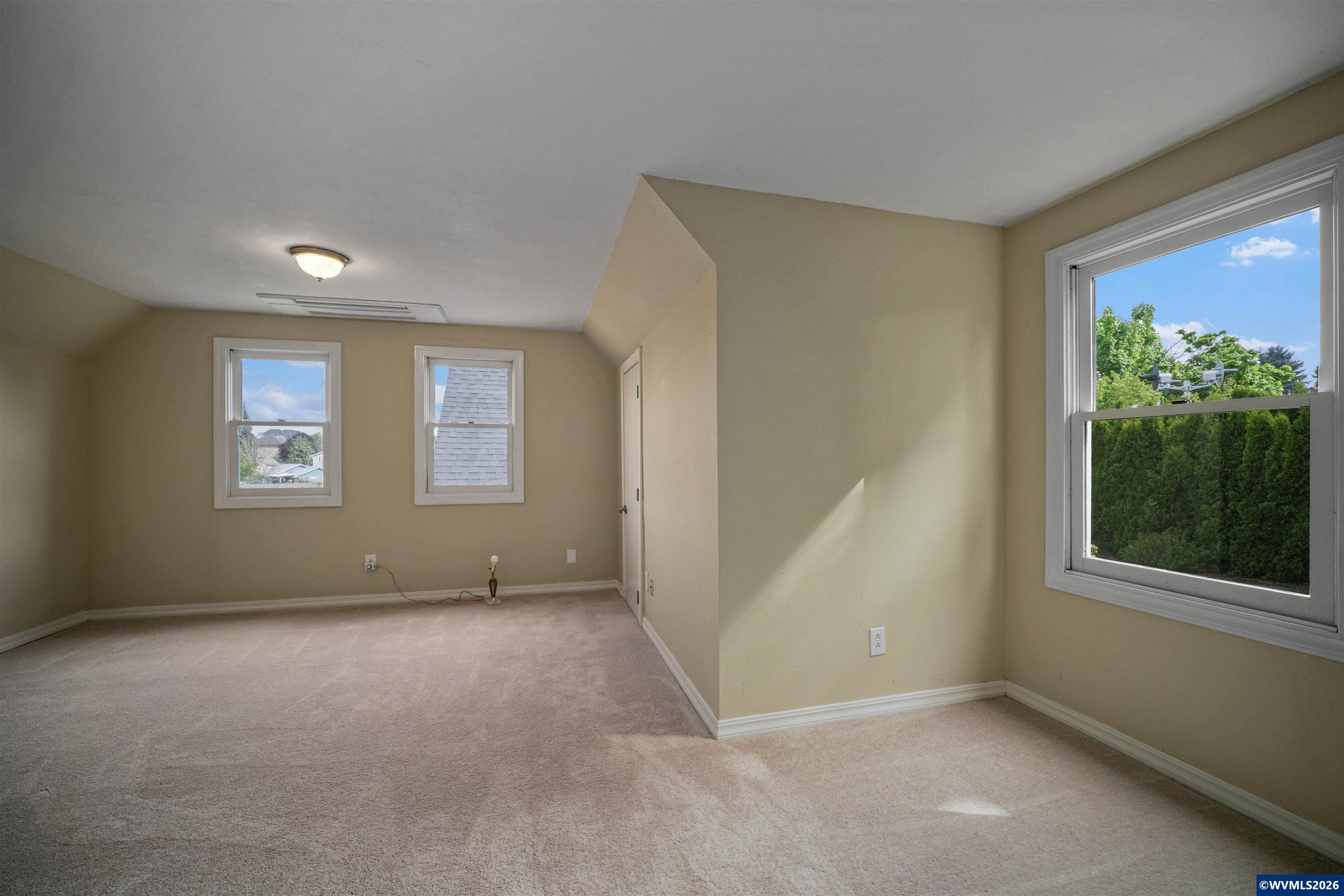 220 Northwest Downy Drive Sublimity, OR 97385 - Photo 32 of 47 an empty room with windows
