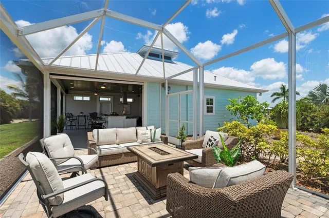 a outdoor living space with furniture and garden view