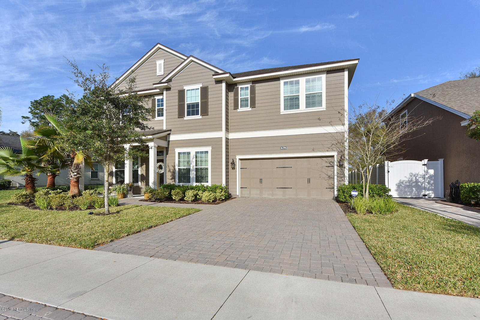 16396 Tisons Bluff Road Jacksonville, FL 32218 - Photo 3 of 30 a front view of a house with a yard