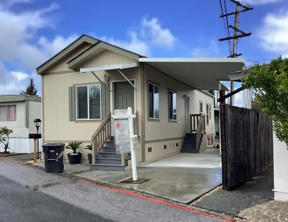 a front view of a house with a garage