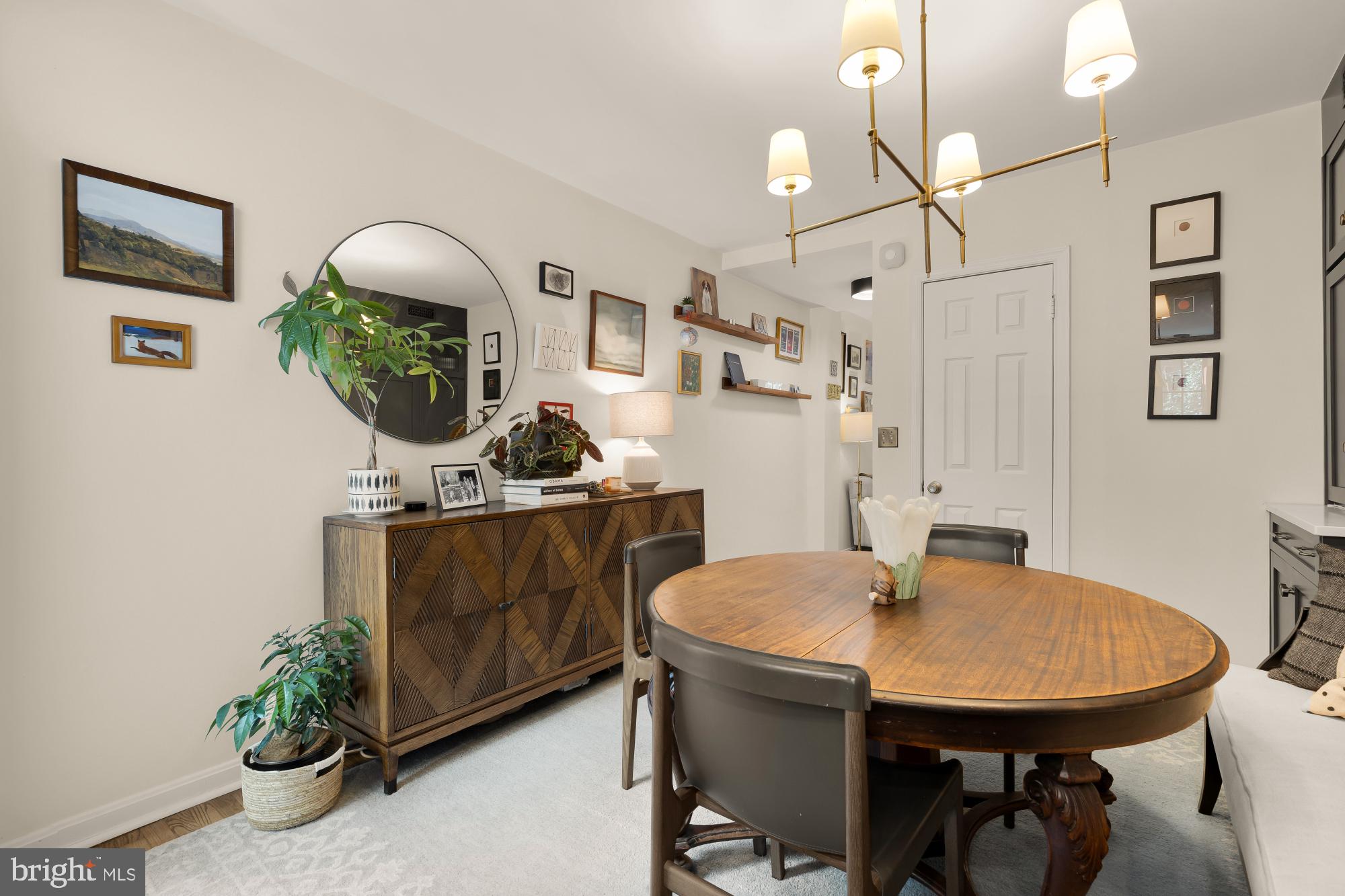 1652 Kalorama Road Northwest Washington, DC 20009 - Photo 5 of 17 a view of a dining room with furniture and wooden floor
