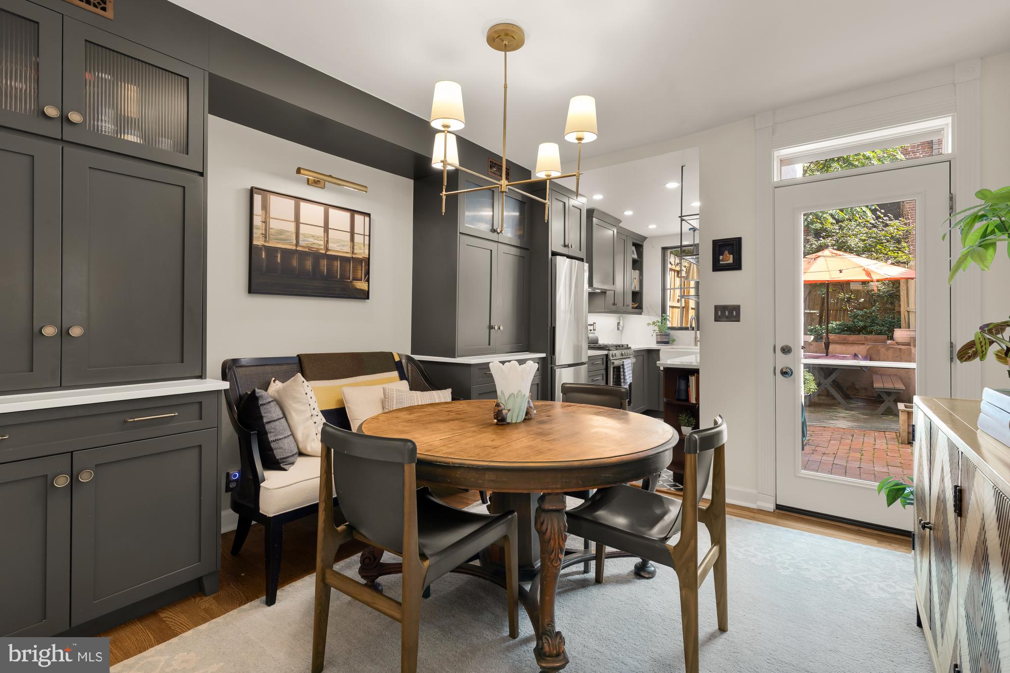 1652 Kalorama Road Northwest Washington, DC 20009 - Photo 6 of 17 a view of a dining room with furniture and a chandelier