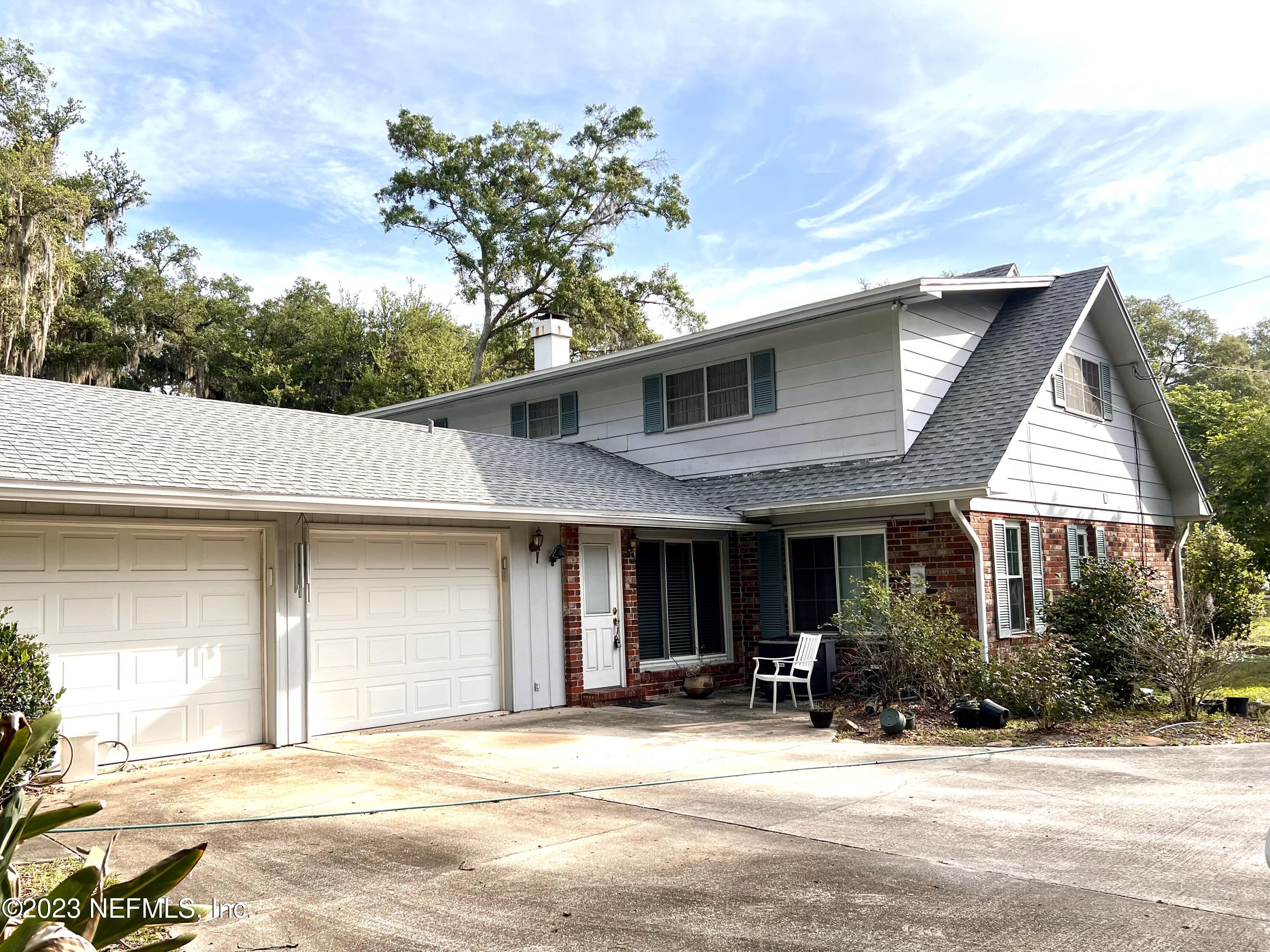 4178 Churchwell Road Jacksonville, FL 32210 - Photo 10 of 10 Around back parking and 2 car Garage