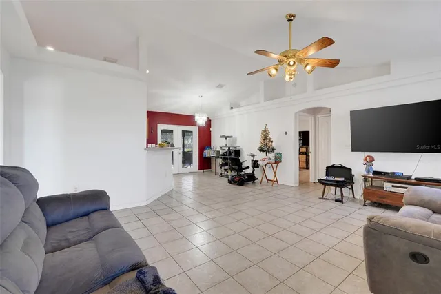 a kitchen with a refrigerator and a sink