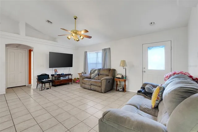a bathroom with a toilet a sink and shower