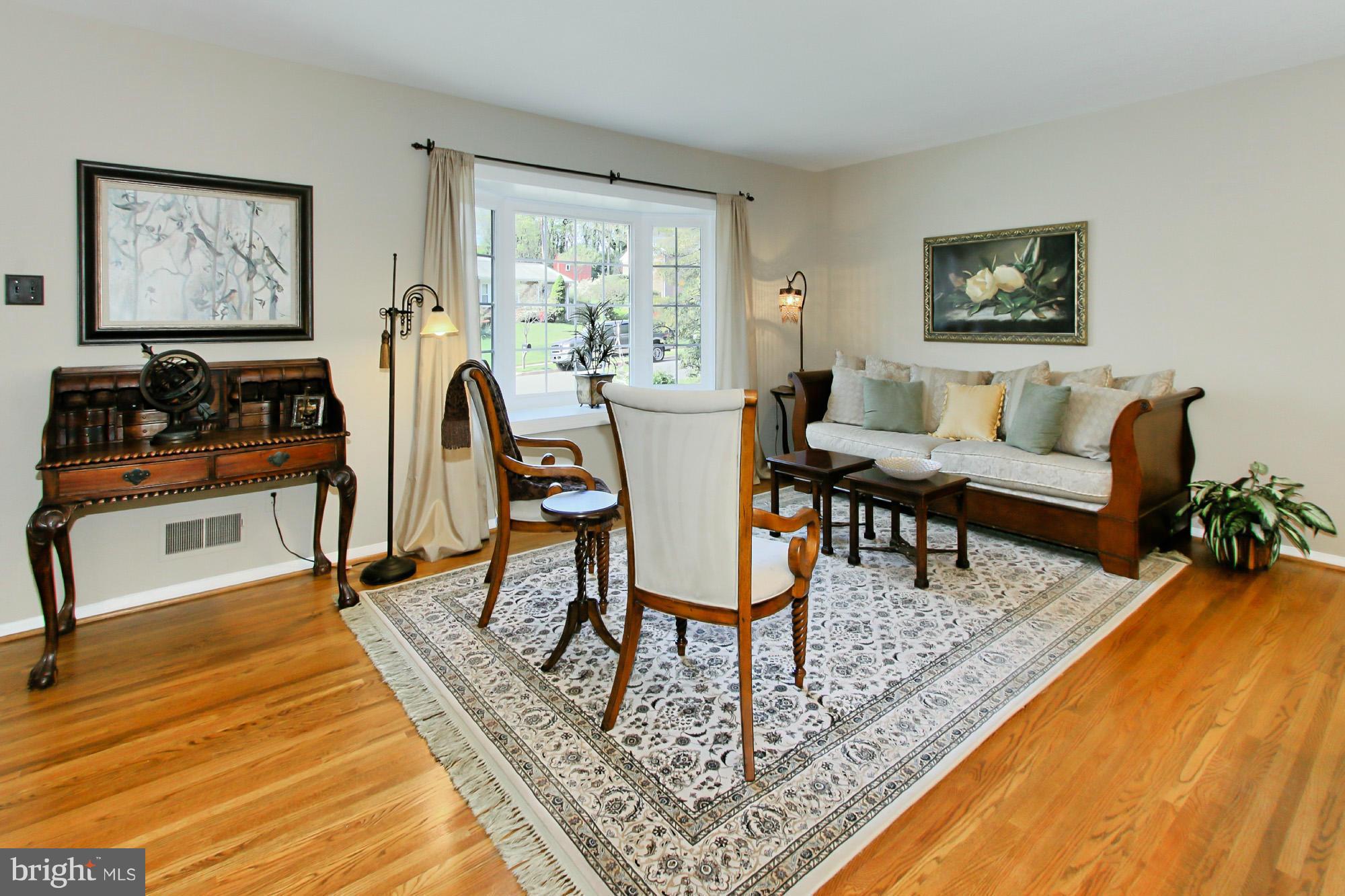 7012 Hadlow Drive Springfield, VA 22152 - Photo 7 of 30 a living room with furniture and a rug