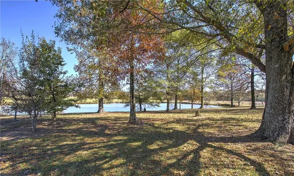 a view of a room with wooden walls
