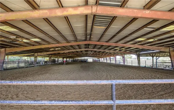 a view of swimming pool with a lounge chair