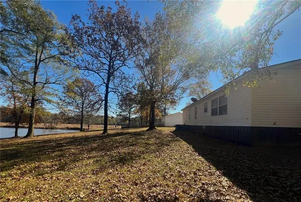 a kitchen with a sink a stove and refrigerator